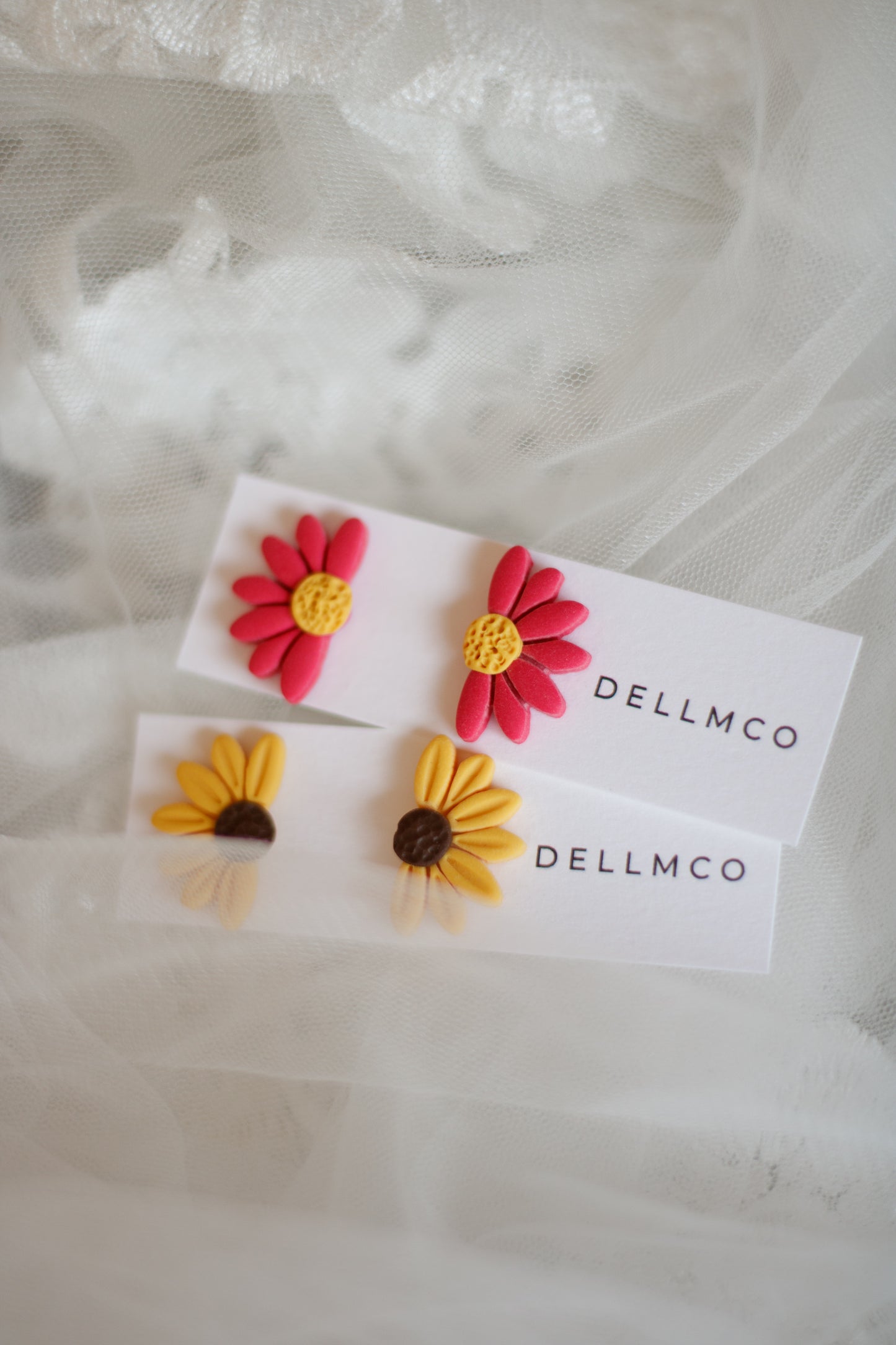 Clous d'oreilles | Demi fleurs | Dellmco