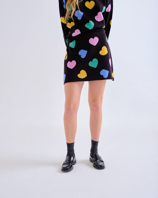 Jupe courte Candy en maille jacquard noire à motifs multicolores, vue de face