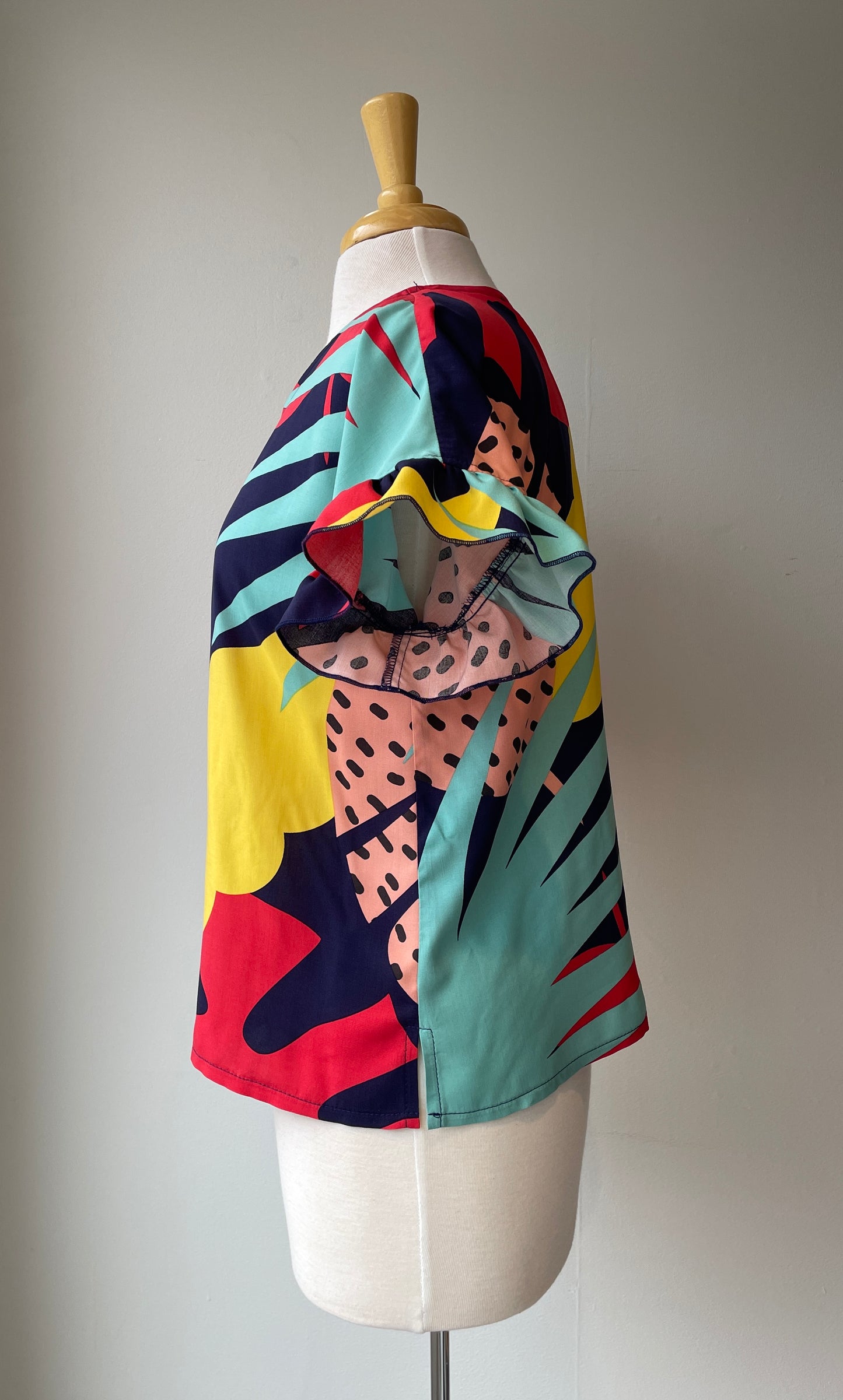 Haut manches courtes avec volant | Tamarillo (Pinkmuchacha)