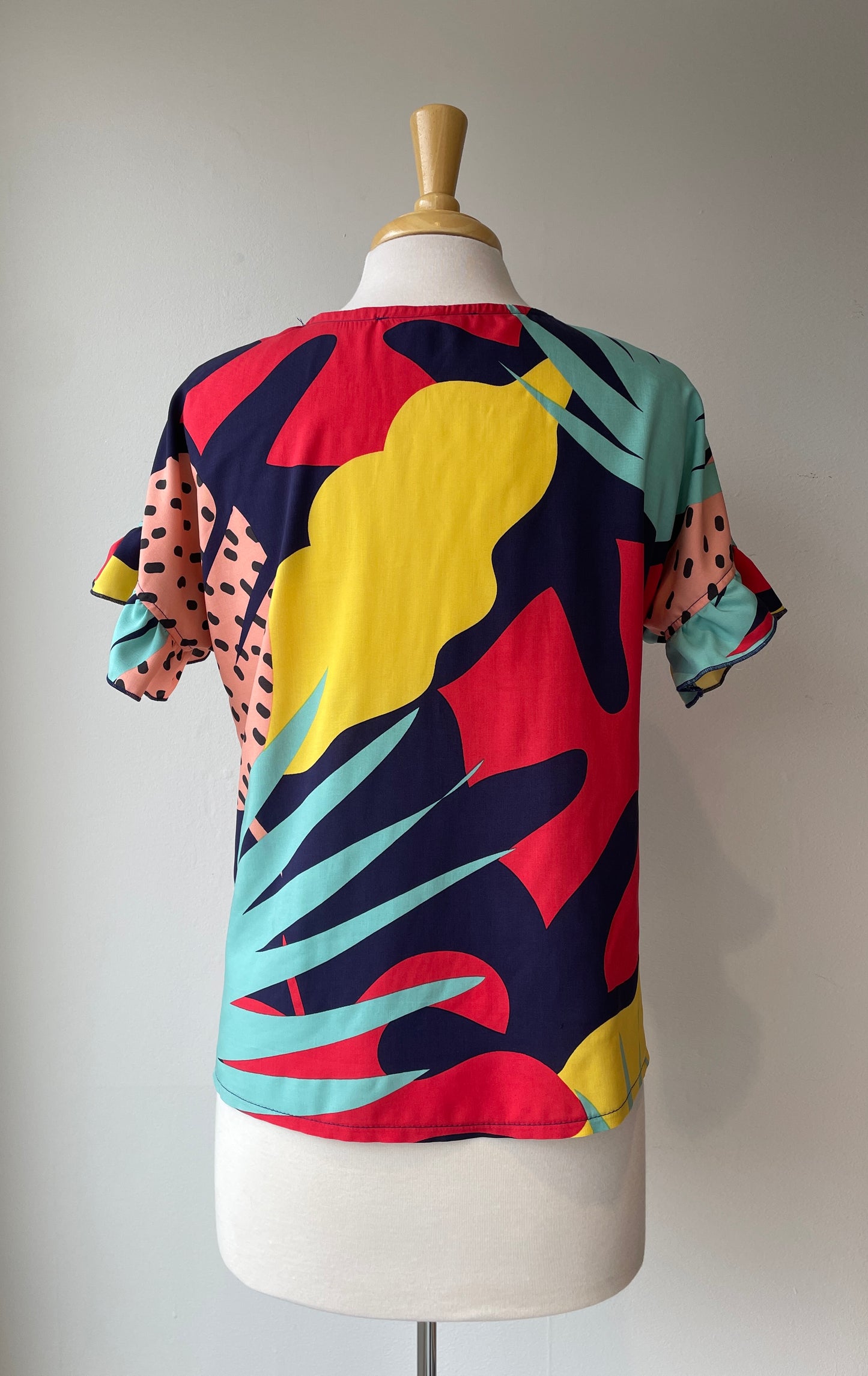 Haut manches courtes avec volant | Tamarillo (Pinkmuchacha)